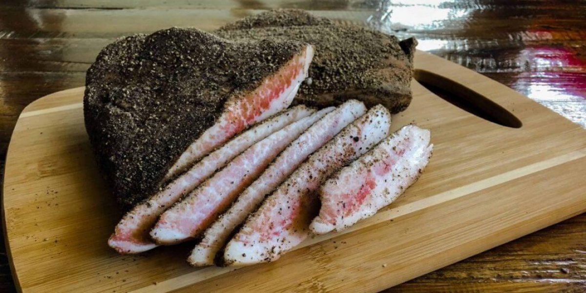 Homemade guanciale (cured pork cheek) Slices of guanciale - the pork jowl (cheek) cured in a mix of salt and spice